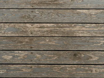 Weather damage on Bothell deck showing peeling paint and moisture issues