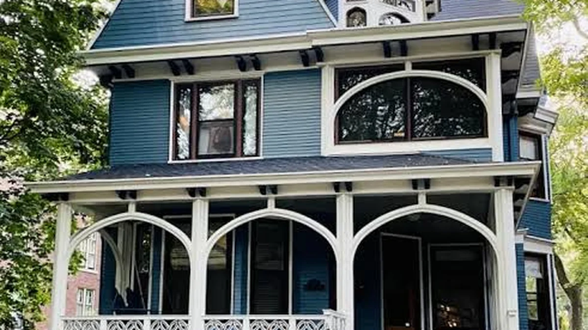 Capitol Hill Seattle Victorian home painted navy blue with white trim — Pizoni Painting Company