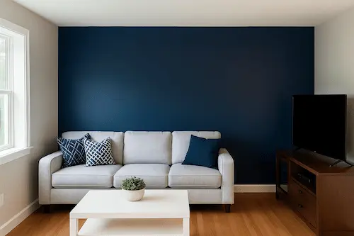 Modern living room painting with navy accent wall in Snohomish