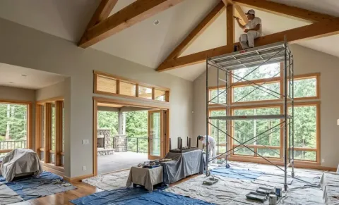 Hollywood Hill Woodinville interior painting — cathedral ceiling great room with warm neutral walls and wood beam details
